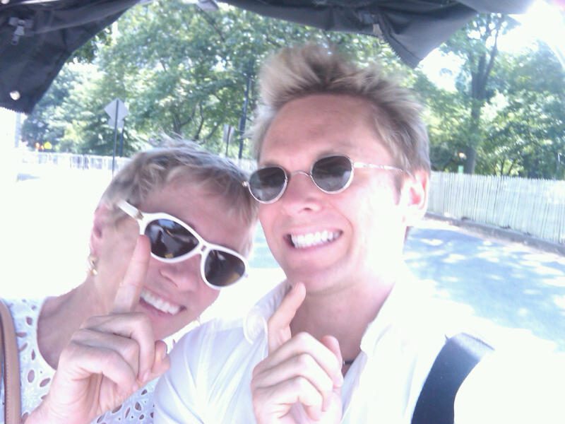 Two people posing happily together