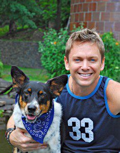Happy man and dog in nature