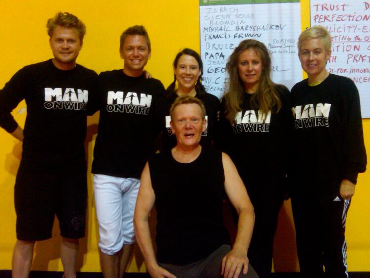 Smiling team in matching shirts