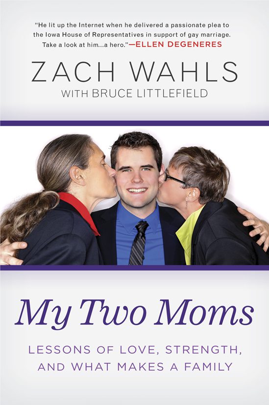 Two women kissing man's cheeks