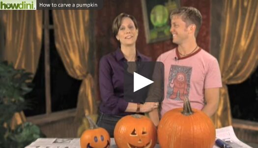 Couple preparing to carve pumpkins