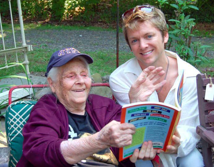 Smiling duo enjoying a book together