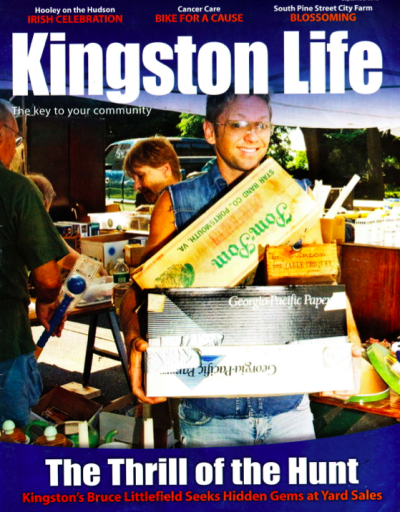 Man smiling at a yard sale