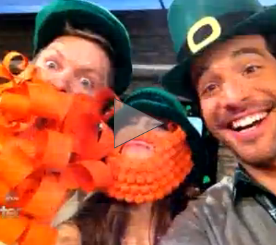 People wearing leprechaun hats and orange beards