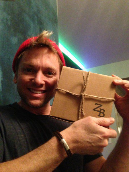 Man holding a wrapped gift box
