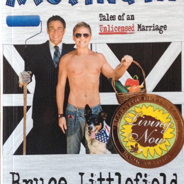 Shirtless man holding basket beside suited man