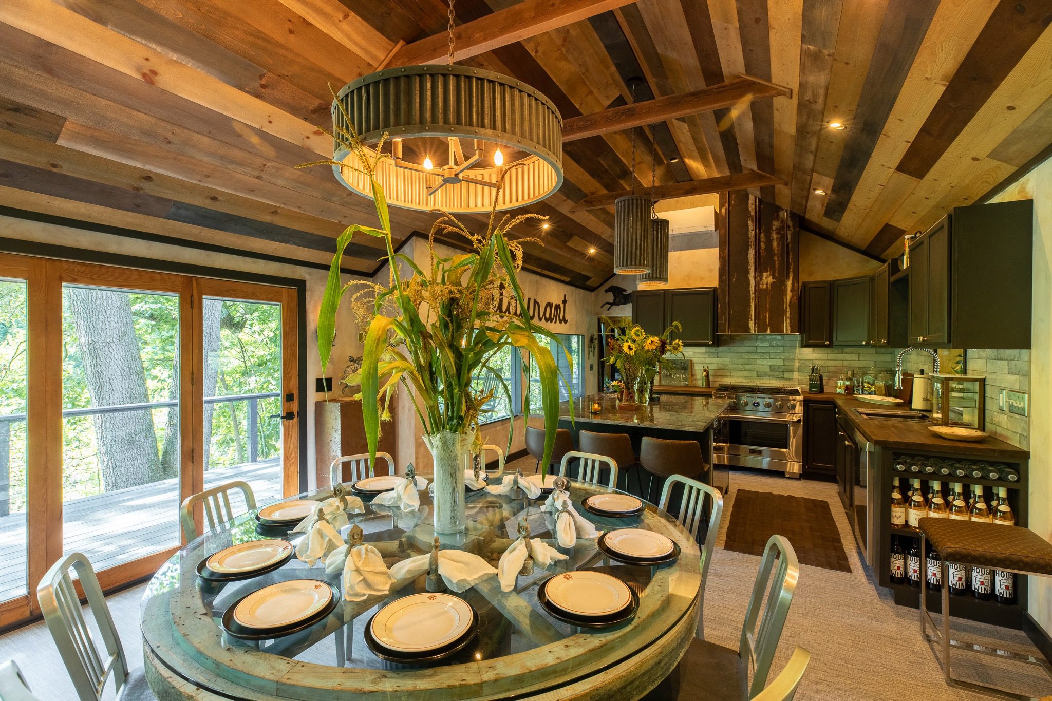 Rustic kitchen with round dining table setup.