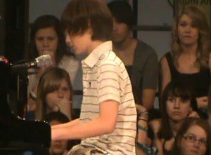 Audience watching a piano performance