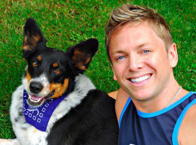 Happy person and dog outdoors