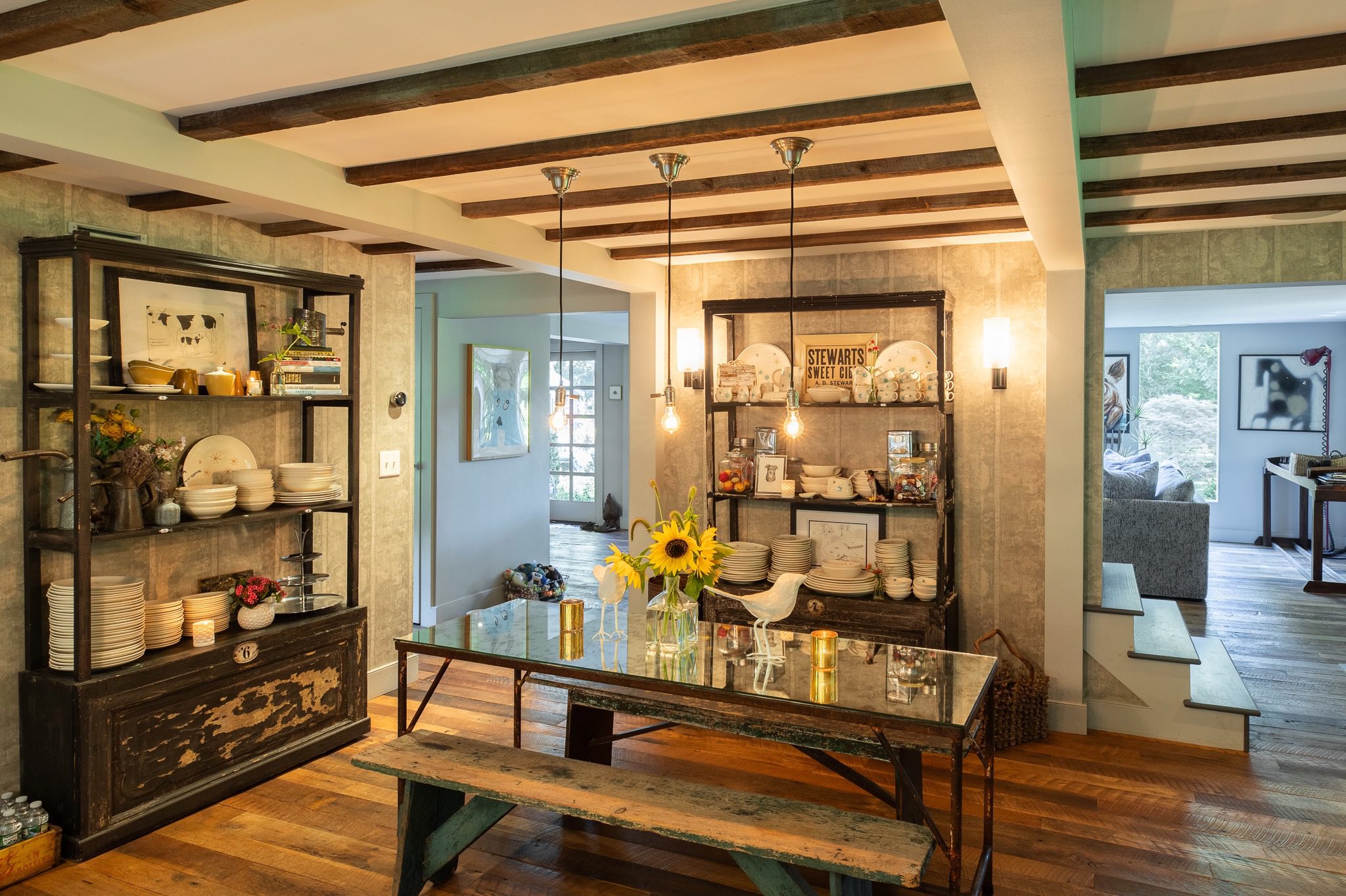 Rustic dining room with decorative shelves.