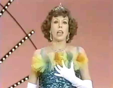 Elegant performer with gloved hand and jewelry