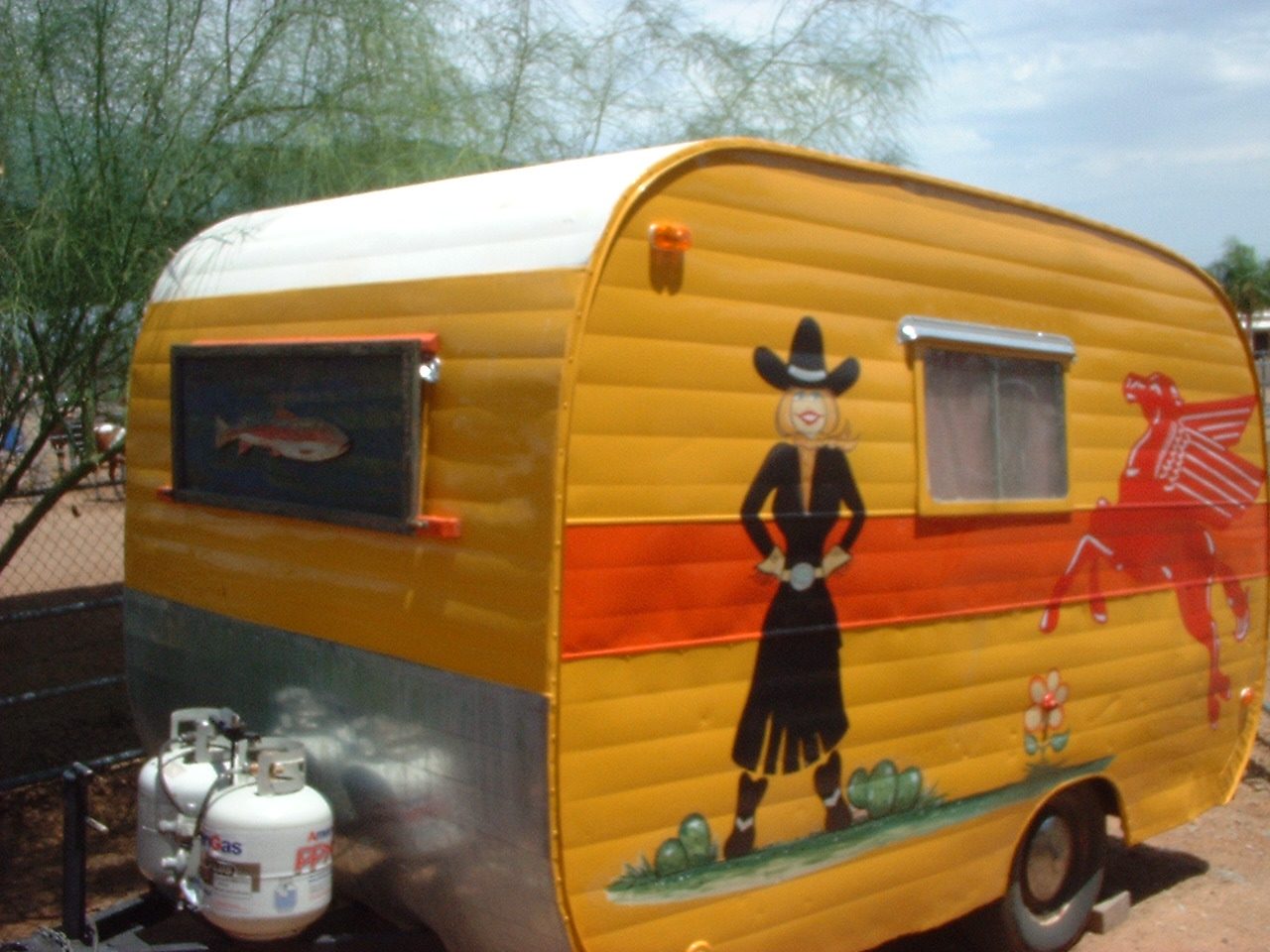 Colorful trailer featuring cowboy and horse