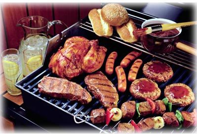 Juicy meats grilling with sauce
