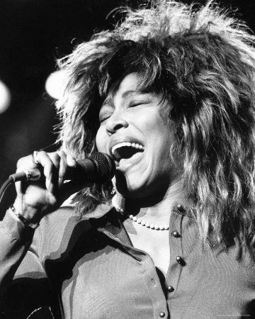 Singer performing passionately on stage