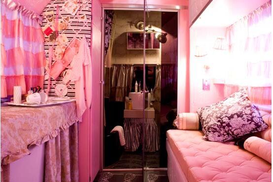 Cozy pink room with patterned curtains