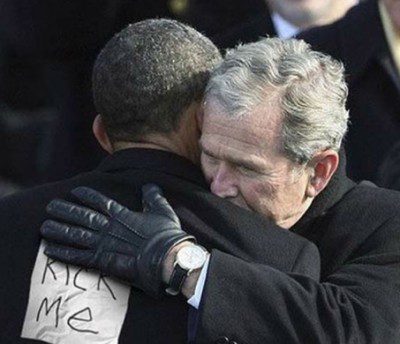 Two men hugging with prank note