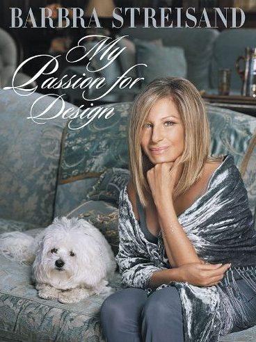 Stylish woman sitting with fluffy dog