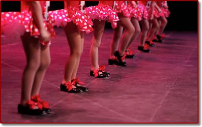 Tap dancers in matching outfits