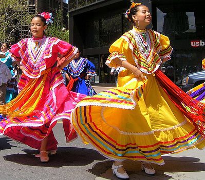 Festive street dance with colorful costumes
