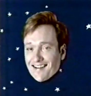 Smiling face surrounded by stars