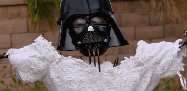 Darth Vader helmet on white dress mannequin