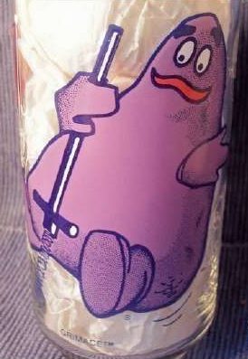 Vintage glass with purple mascot design