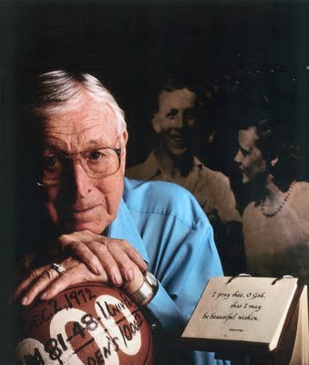Elderly man with basketball and book