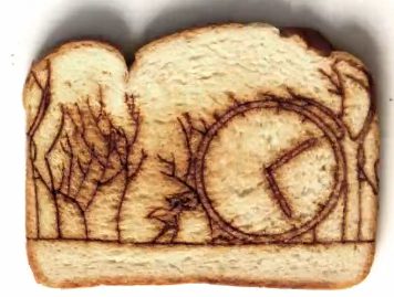 Forest scene engraved on toasted slice