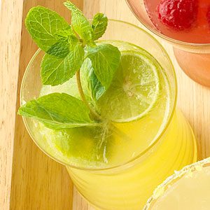 Citrus drink garnished with mint