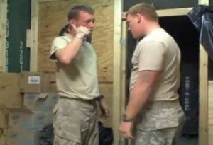 Military personnel interacting indoors