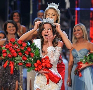 Beauty pageant winner crowned with roses