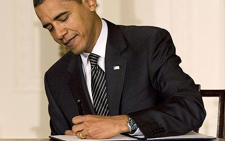 Person in a suit with a pen
