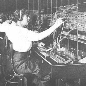 Historic switchboard operator in action