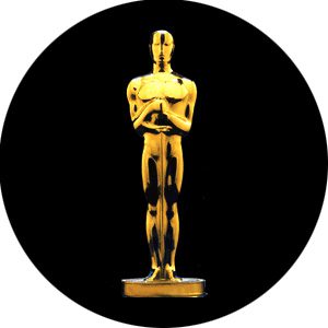 Golden award statue on black background