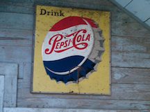 Old-fashioned Pepsi-Cola logo display