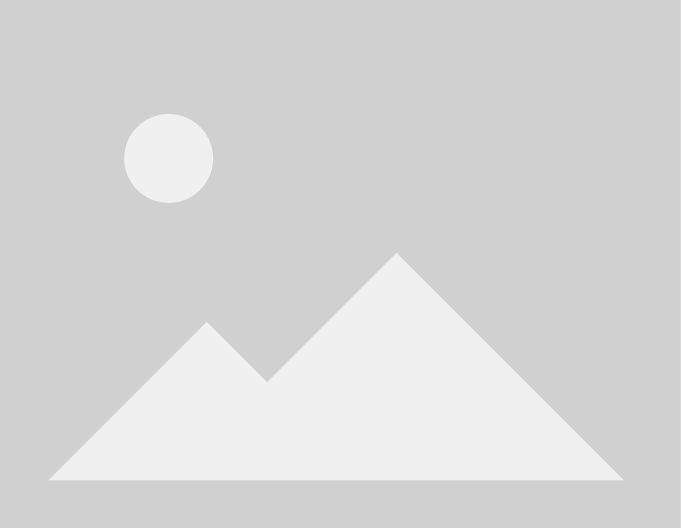 Placeholder image with mountains and sun.