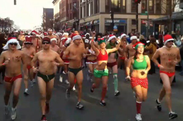 People running in festive holiday attire