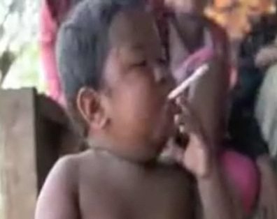 Boy holding a cigarette