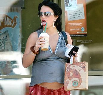 Stylish woman with sunglasses enjoying coffee
