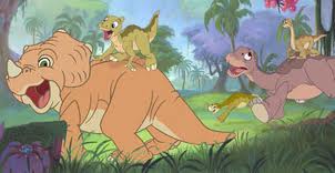 Dinosaurs in a colorful prehistoric forest