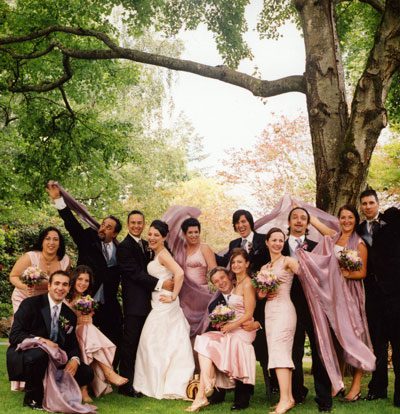 Group celebrating outdoors in formal attire