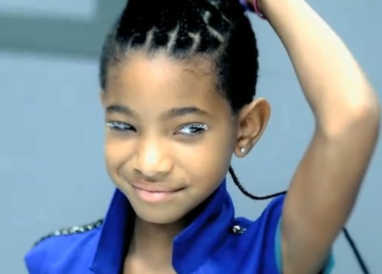 Girl in blue jacket smiling
