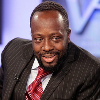 Man in a suit smiling