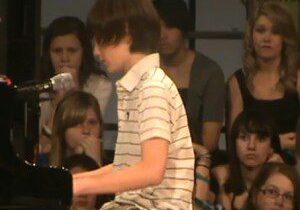 Audience watching a piano performance