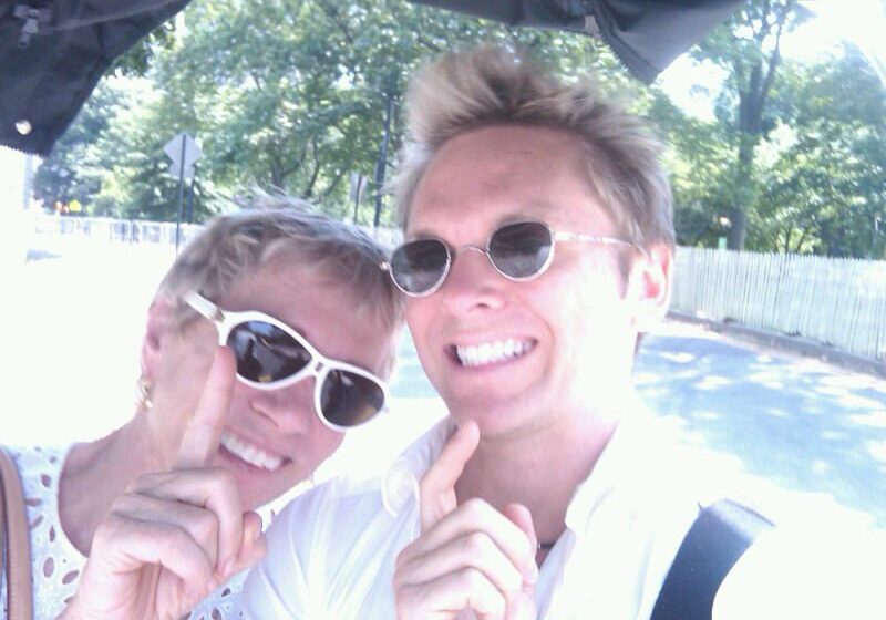 Two people posing happily together
