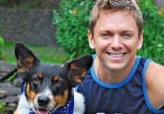 Happy man and dog in nature