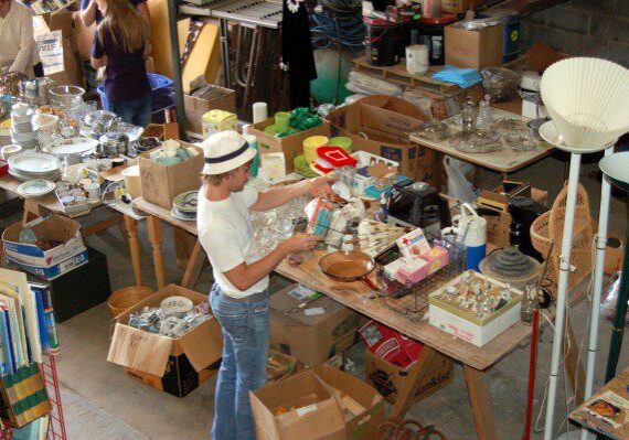 Shopper exploring a table of items
