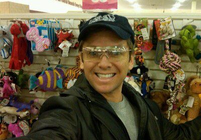Man with glasses at pet store