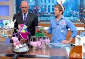 Two men presenting Easter decorations