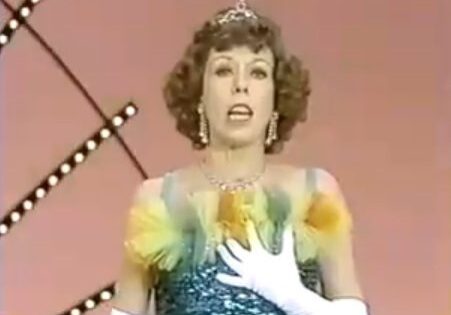 Elegant performer with gloved hand and jewelry